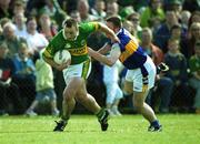 13 May 2001; John Crowley of Kerry holds off the challenge of Niall Kelly of Tipperary during the Bank of Ireland Munster Senior Football Championship Quarter-Final match between Tipperary and Kerry at Ned Hall Park in Clonmel, Tipperary. Photo by Brendan Moran/Sportsfile