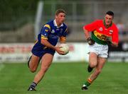 13 May 2001; Barry O'Donovan of Wicklow in action against John McGrath of Carlow during the Bank of Ireland Leinster Senior Football Championship First Round match between Carlow and Wicklow at St Conleth's Park in Newbridge, Kildare. Photo by Matt Browne/Sportsfile