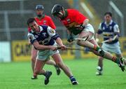 29 April 2001; Cyril Cuddy of Laois in action against Michael Slye of Carlow during the Guinness Leinster Senior Hurling Championship Preliminary Round match between Carlow and Laois at Dr Cullen Park in Carlow. Photo by Damien Eagers/Sportsfile