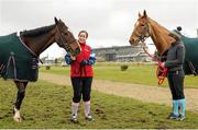 16 March 2016; OLBG Mares' Hurdle winner Vroum Vroum Mag and stable hand Steph Searle, left, with Stan James Champion Hurdle Challenge Trophy winner Annie Power and stable hand Nim Spalding, right, on the gallops ahead of Day 2 at the Cheltenham Festival 2016. Prestbury Park, Cheltenham, Gloucestershire, England. Picture credit: Seb Daly / SPORTSFILE