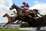 16 March 2016; Blaklion, hidden, with Ryan Hatch up, jumps the the last alongside Shaneshill, left, with Paul Townend up, who finished second, and No More Heroes, right, with Bryan Cooper, who finished third, on their winning the RSA Steeple Chase. Prestbury Park, Cheltenham, Gloucestershire, England. Picture credit: Cody Glenn / SPORTSFILE