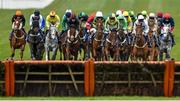 16 March 2016; A general view of runners and riders during the first circuit of the Coral Cup Hurdle. Prestbury Park, Cheltenham, Gloucestershire, England. Picture credit: Seb Daly / SPORTSFILE