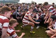16 March 2016; Colaiste Iognaid captain Morgan Codyre celebrates with his team-mates and supporters at the end of the game. 2016 Top Oil Schools Senior Cup Final, Colaiste Iognaid v Garbally College, The Sportsground, College Road, Galway. Picture credit: David Maher / SPORTSFILE