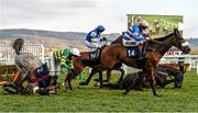 16 March 2016; Diego Du Charmil, with Sam Twiston-Davies up, on their way to winning the Fred Winter Juvenile Handicap Hurdle as Campeador, with Barry Geraghty up, left, and Voix Du Reve, with Ruby Walsh up, right, fall at the last. Also pictured Coo Star Sivola, with Lizzie Kelly up, back centre. Prestbury Park, Cheltenham, Gloucestershire, England. Picture credit: Cody Glenn / SPORTSFILE