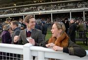16 March 2016; A racegoing couple celebrate their win in the Weatherbys Champion Bumper. Prestbury Park, Cheltenham, Gloucestershire, England. Picture credit: Cody Glenn / SPORTSFILE