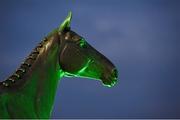 16 March 2016; The Arkle, pictured, and Dawn Run Statues were lit green ahead of St Patrick’s Day to mark Arkle’s 50th and Dawn Run’s 30th anniversary of winning the Gold Cup. Prestbury Park, Cheltenham, Gloucestershire, England Picture credit: Cody Glenn / SPORTSFILE