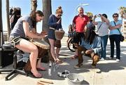 16 March 2016; Ciamh Dollard, left, Laois, and Sinead Finnegan, Dublin, play bongo drums near the beach during a tour of the city of San Diego. TG4 Ladies Football All-Star Tour. San Diego, California, USA. Picture credit: Brendan Moran / SPORTSFILE