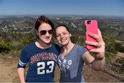 16 March 2016; Laois footballers Maggie Murphy, left, and Ciamh Dollard take a selfie on Mount Soledad, during a tour of the city of San Diego. TG4 Ladies Football All-Star Tour. San Diego, California, USA. Picture credit: Brendan Moran / SPORTSFILE