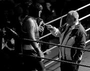 27 February 2010; Tommy Sheehan, St Michaels Athy, is spoken to by trainer Dominic O'Rourke, President of the Irish Amateur Boxing Association, during their 91+kg bout with Gareth Smith, Crumlin. National Mens Elite Championships Semi-Finals - Saturday, National Stadium, Dublin. Picture credit: Stephen McCarthy / SPORTSFILE
