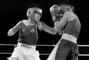 5 March 2010; Katie Taylor, Bray, Ireland, right, exchanges punches with Julia Tsyplakova, Ukraine, during their womens 60kg special bout. National Men's & Women's Elite National Championships 2010 Finals - Friday, National Stadium, Dublin. Picture credit: Stephen McCarthy / SPORTSFILE