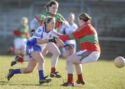 7 March 2010; Ciara McAnespie, Monaghan, flicks the ball past Yvonne Byrne, Mayo. Bord Gais Energy Ladies National Football League Division 1 Round 4, Monaghan v Mayo Emyvale, Co. Monaghan. Picture credit: Oliver McVeigh / SPORTSFILE