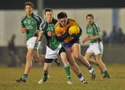 10 March 2010; Conor Ryan, Clare, in action against David Ward, Limerick. Cadbury Munster GAA Football Under 21 Quarter-Final, Limerick v Clare, Cooraclare GAA Club, Co. Clare. Picture credit: Diarmuid Greene / SPORTSFILE