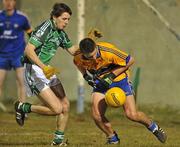 10 March 2010; Liam Markham, Clare, in action against Eoghan O'Connor, Limerick. Cadbury Munster GAA Football Under 21 Quarter-Final, Limerick v Clare, Cooraclare GAA Club, Co. Clare. Picture credit: Diarmuid Greene / SPORTSFILE
