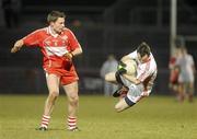 10 March 2010; Aidan Girvan, Tyrone, in action against James Kielt, Derry. Cadbury Ulster GAA Football Under 21 Championship, Preliminary Round, Tyrone v Derry, Healy Park, Omagh, Co. Tyrone. Picture credit: Oliver McVeigh / SPORTSFILE
