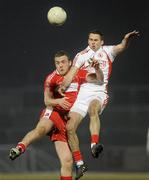 10 March 2010; Emmett McGuckian, Derry, in action against Kyle Coney, Tyrone. Cadbury Ulster GAA Football Under 21 Championship, Preliminary Round, Tyrone v Derry, Healy Park, Omagh, Co. Tyrone. Picture credit: Oliver McVeigh / SPORTSFILE