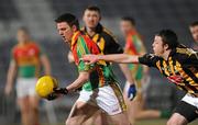 10 March 2010; Cathal Coughlan, Carlow, in action against Paul Naughton, Kilkenny. Cadbury Leinster GAA Football Under 21 Quarter-Final, Carlow v Kilkenny, O'Moore Park, Portlaoise, Co. Laois. Picture credit: Matt Browne / SPORTSFILE