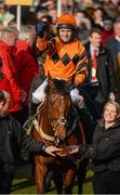 17 March 2016; Tom Scudamore celebrates as he enters the winners' enclosure after winning the Ryanair World Hurdle on Thistlecrack. Prestbury Park, Cheltenham, Gloucestershire, England. Picture credit: Seb Daly / SPORTSFILE