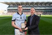 17 March 2016; Pictured is Brian Keating, AIB Group Brands Director, presenting Adrian Breen, Na Piarsaigh, with the Man of the Match award for his outstanding performance in the AIB GAA Senior Hurling Club Championship Final, Na Piarsaigh vs Ruairí Óg, Cushendall in Croke Park on St Patrick’s Day. For exclusive content and to see why AIB are backing Club and County follow us @AIB_GAA and on Facebook at Facebook.com/AIBGAA. AIB GAA Hurling All-Ireland Senior Club Championship Final, Na Piarsaigh v Ruairí Óg, Croke Park, Dublin. Picture credit: Stephen McCarthy / SPORTSFILE