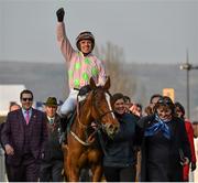 17 March 2016; Ruby Walsh celebrates as he enters the winners' enclosure after winning the Trull House Stud Mares Novices' Hurdle on Limini. Prestbury Park, Cheltenham, Gloucestershire, England. Picture credit: Seb Daly / SPORTSFILE