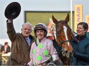 17 March 2016; Trainer Willie Mullins, left, and jockey Ruby Walsh smile to the crowd in the winners' enclosure after winning the Trull House Stud Mares Novices' Hurdle with Limini. Prestbury Park, Cheltenham, Gloucestershire, England. Picture credit: Seb Daly / SPORTSFILE