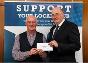 17 March 2016; GAA Vice President and Chairman of Leinster Council John Horan presents Don Reynolds, Eslin, Co Leitrim, who won a travel voucher to the value of €1,500,  during the presentation of prizes to the winners of the GAA National Club Draw. Nally Suite, Croke Park, Dublin. Picture credit: Ray McManus / SPORTSFILE