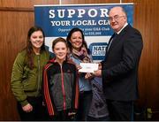 17 March 2016; GAA Vice President and Chairman of Leinster Council John Horan presents Deirdre Smith, Ballygunner, Waterford,  who was accompanied by Caoimhe and Patrick, who won an All-Ireland Football Final Corporate Package 2016, during the presentation of prizes to the winners of the GAA National Club Draw. Nally Suite, Croke Park, Dublin. Picture credit: Ray McManus / SPORTSFILE