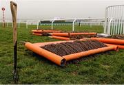 18 March 2016; A general view of a groundsman's pitch fork sitting beside spare hurdle panels ahead of Day 4 of the Cheltenham Festival. Prestbury Park, Cheltenham, Gloucestershire, England. Picture credit: Seb Daly / SPORTSFILE