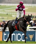 18 March 2016; Bryan Cooper celebrates as he crosses the line to win the Timico Cheltenham Gold Cup on Don Cossack. Prestbury Park, Cheltenham, Gloucestershire, England. Picture credit: Seb Daly / SPORTSFILE