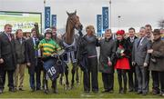 18 March 2016; On The Fringe, Jockey Nina Carberry, Trainer Enda Bolger, behind her, owner J.P. McManus, sixth from right, and the winning connections of the St. James’s Place Foxhunter Steeple Chase Challenge Cup. Prestbury Park, Cheltenham, Gloucestershire, England. Picture credit: Cody Glenn / SPORTSFILE