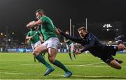18 March 2016; Jacob Stockdale, Ireland, on his way to scoring his side's second try of the game despite the tackle of Tom Galbraith, Scotland. Electric Ireland U20 Six Nations Rugby Championship, Ireland v Scotland. Donnybrook Stadium, Donnybrook, Dublin. Picture credit: Ramsey Cardy / SPORTSFILE