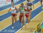 12 March 2010; Ethiopia's Kalkidan Gezahegne crosses the line ahead of Poland's Sylwia Ejdys, left, and Natalia Rodriguez, Spain, right, to win her Women's 1500m heat at the 13th IAAF World Indoor Athletics Championships, Doha, Qatar. Picture credit: Pat Murphy / SPORTSFILE