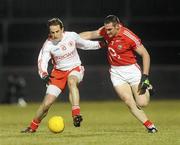 13 March 2010; Mark Donnelly, Tyrone, in action against Noel O'Leary, Cork. Allianz GAA Football National League, Division 1, Round 4, Tyrone v Cork, Healy Park, Omagh, Co. Tyrone. Picture credit: Oliver McVeigh / SPORTSFILE
