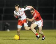 13 March 2010; Mark Donnelly, Tyrone, in action against Noel O'Leary, Cork. Allianz GAA Football National League, Division 1, Round 4, Tyrone v Cork, Healy Park, Omagh, Co. Tyrone. Picture credit: Oliver McVeigh / SPORTSFILE