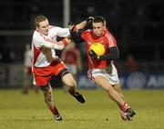 13 March 2010; Patrick Kelly, Cork, in action against Aidan Cassidy, Tyrone. Allianz GAA Football National League, Division 1, Round 4, Tyrone v Cork, Healy Park, Omagh, Co. Tyrone. Picture credit: Oliver McVeigh / SPORTSFILE