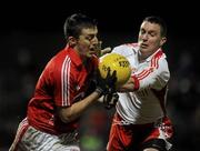 13 March 2010; Ray Carey, Cork, in action against Tommy McGuigan, Tyrone. Allianz GAA Football National League, Division 1, Round 4, Tyrone v Cork, Healy Park, Omagh, Co. Tyrone. Picture credit: Oliver McVeigh / SPORTSFILE