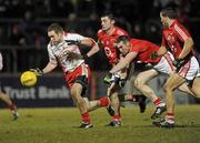13 March 2010; Aidan Cassidy, Tyrone, in action against Donncha O’Connor and Noel O'Leary, Cork. Allianz GAA Football National League, Division 1, Round 4, Tyrone v Cork, Healy Park, Omagh, Co. Tyrone. Picture credit: Oliver McVeigh / SPORTSFILE