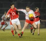 13 March 2010; Sean O'Neill, Tyrone, in action against Conor O'Driscoll, Cork. Allianz GAA Football National League, Division 1, Round 4, Tyrone v Cork, Healy Park, Omagh, Co. Tyrone. Picture credit: Oliver McVeigh / SPORTSFILE
