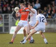 14 March 2010; Kieran Toner, Armagh, in action against Ken Donnelly and John Doyle, Kildare. Allianz GAA Football National League, Division 2, Round 4, Armagh v Kildare, St Oliver Plunkett Park, Crossmaglen, Co. Armagh. Picture credit: Oliver McVeigh / SPORTSFILE