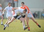 14 March 2010; Padraig O'Neill, Kildare, in action against Brendan Donaghy, Armagh. Allianz GAA Football National League, Division 2, Round 4, Armagh v Kildare, St Oliver Plunkett Park, Crossmaglen, Co. Armagh. Picture credit: Oliver McVeigh / SPORTSFILE