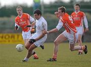 14 March 2010; Padraig O'Neill, Kildare, in action against Kieran Toner, Armagh. Allianz GAA Football National League, Division 2, Round 4, Armagh v Kildare, St Oliver Plunkett Park, Crossmaglen, Co. Armagh. Picture credit: Oliver McVeigh / SPORTSFILE