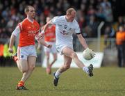14 March 2010; James Kavanagh, Kildare, in action against Finnian Moriarty, Armagh. Allianz GAA Football National League, Division 2, Round 4, Armagh v Kildare, St Oliver Plunkett Park, Crossmaglen, Co. Armagh. Picture credit: Oliver McVeigh / SPORTSFILE