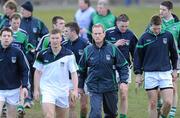 14 March 2010; Limerick manager Justin McCarthy makes his way to the team dressing room with his players before the start of the game. Allianz GAA Hurling National League, Division 1, Round 3, Waterford v Limerick, Fraher Field, Dungarvan, Co. Waterford. Picture credit: Matt Browne / SPORTSFILE