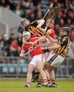 14 March 2010; Niall McCarthy, left, and team-mate Mark O'Sullivan, Cork, contest possession with John Dalton, 4, and Jackie Tyrrell, Kilkenny. Allianz GAA Hurling National League, Division 1, Round 3, Cork v Kilkenny, Pairc Ui Chaoimh, Cork. Picture credit: Brendan Moran / SPORTSFILE