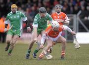 14 March 2010; Paddy McArdle, Armagh, in action against David Maher, London. Allianz GAA Hurling National League, Division 3A, Round 3, Armagh v London, St Oliver Plunkett Park, Crossmaglen, Co. Armagh. Picture credit: Oliver McVeigh / SPORTSFILE