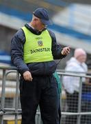 14 March 2010; Meath manager Eamon O'Brien checks his stopwatch in the dying minutes of the match. Allianz GAA Football National League, Division 2, Round 4, Tipperary v Meath, Semple Stadium, Thurles, Co. Tipperary. Picture credit: Brian Lawless / SPORTSFILE