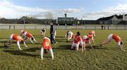 14 March 2010; Armagh fitness coach Mike McGurn and players during the team warm down. Allianz GAA Football National League, Division 2, Round 4, Armagh v Kildare, St Oliver Plunkett Park, Crossmaglen, Co. Armagh. Picture credit: Oliver McVeigh / SPORTSFILE