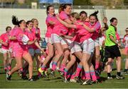 19 March 2016; Cora Staunton, 3rd from right, Mayo and 2015 All Stars, is congratulated by her team-mates, including Sinead Goldrick, Dublin, Aimee Mackin, Armagh, Annie Walsh, Cork and Geraldine McLaughlin, Donegal, after scoring the winning penalty in a penalty shoot out after the game. TG4 Ladies Football All-Star Tour, 2014 All Stars v 2015 All Stars. University of San Diego, Torero Stadium, San Diego, California, USA. Picture credit: Brendan Moran / SPORTSFILE