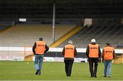 20 March 2016; Stewards make their way across the pitch at Nowlan Park to take up their positions ahead of the game. Allianz Hurling League, Division 1A, Round 5, Kilkenny v Dublin. Nowlan Park, Kilkenny. Picture credit: Stephen McCarthy / SPORTSFILE