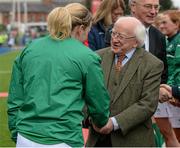 20 March 2016; President of Ireland Michael D. Higgins shakes hands with Ireland captain Niamh Briggs before the match. Women's Six Nations Rugby Championship, Ireland v Scotland. Donnybrook Stadium, Donnybrook, Dublin. Picture credit: Seb Daly / SPORTSFILE