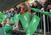 20 March 2016; Ireland captain Niamh Briggs signs flags for supporters following her team's victory over Scotland. Women's Six Nations Rugby Championship, Ireland v Scotland. Donnybrook Stadium, Donnybrook, Dublin. Picture credit: Seb Daly / SPORTSFILE